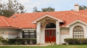 Spanish-style home with red tiled roof